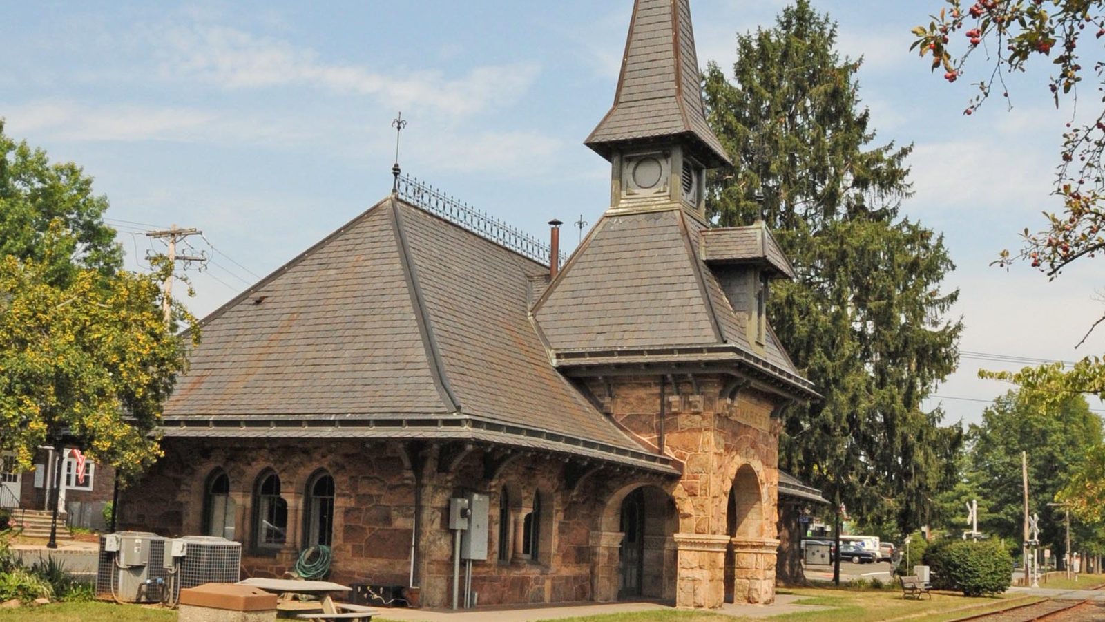 The historic 1872 Demarest Railroad Depot with its stone turret, in Demarest, NJ